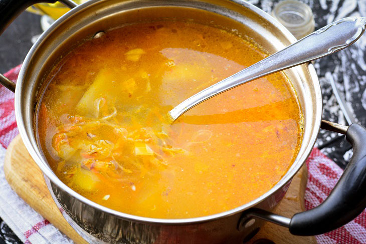 Kapustnyak soup with chicken and sauerkraut is a hearty meal for the whole family