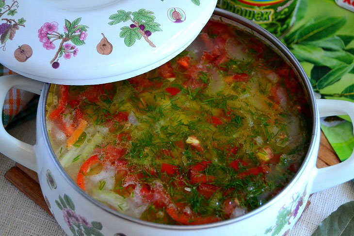 Summer fragrant soup with young cabbage and green peas