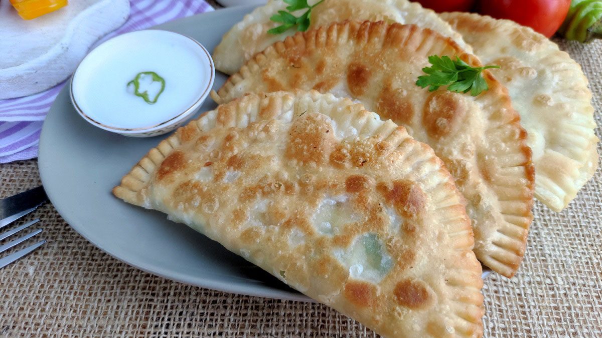 Chebureks with chicken at home – crispy, tender and juicy