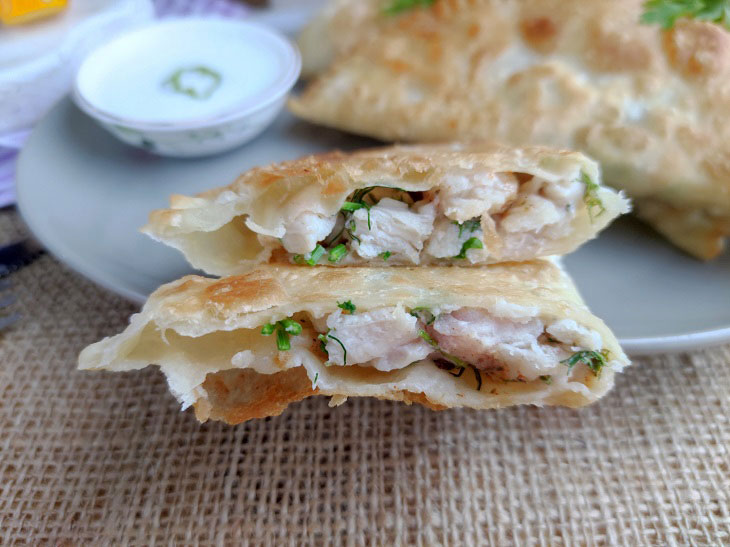 Chebureks with chicken at home - crispy, tender and juicy
