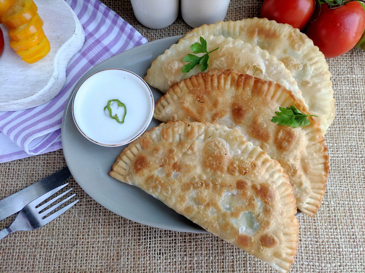 Chebureks with chicken at home - crispy, tender and juicy
