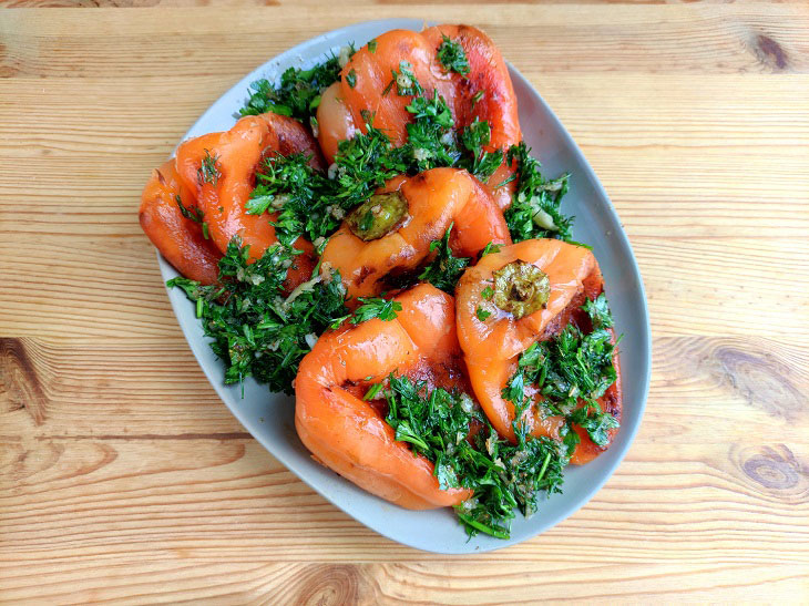 Fried peppers in a pan - a fragrant and spicy snack