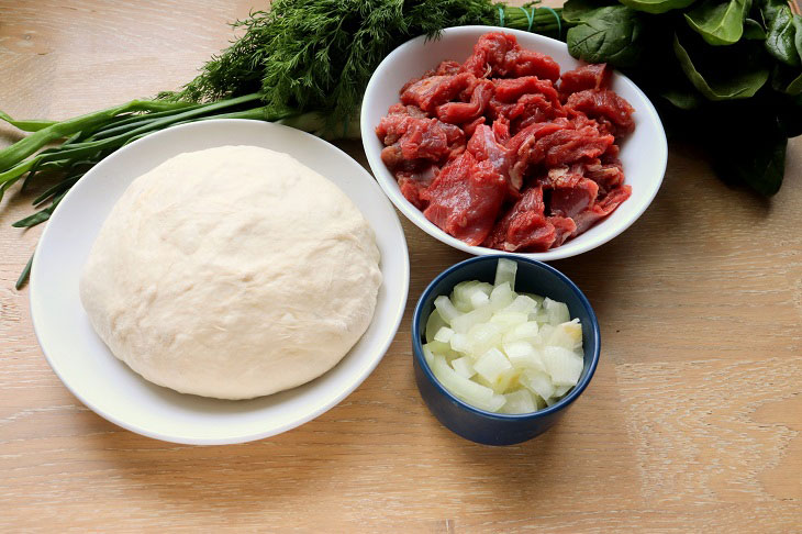 Ossetian pies with meat and herbs - delicious, juicy and fragrant