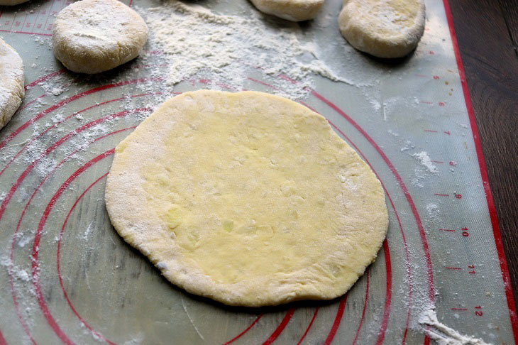 Potato cakes with cheese in a pan - tasty and fragrant