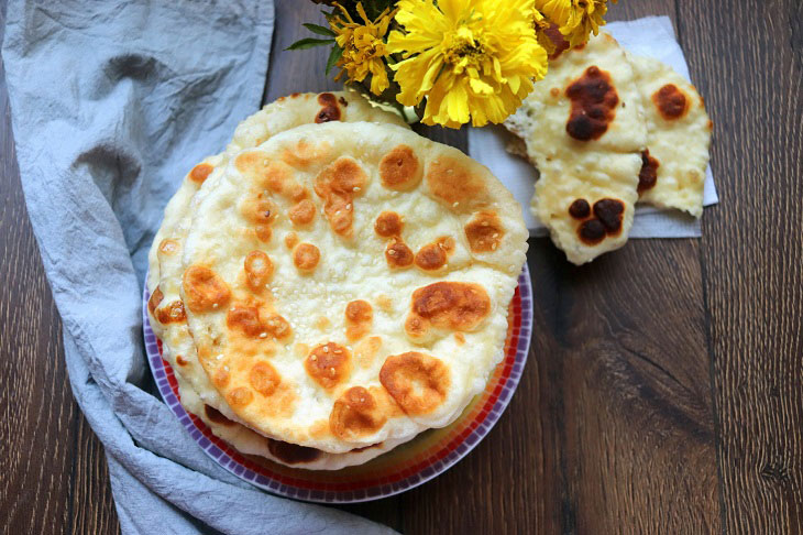 Flatbreads "Bhaturi" - a delicious snack of Indian cuisine