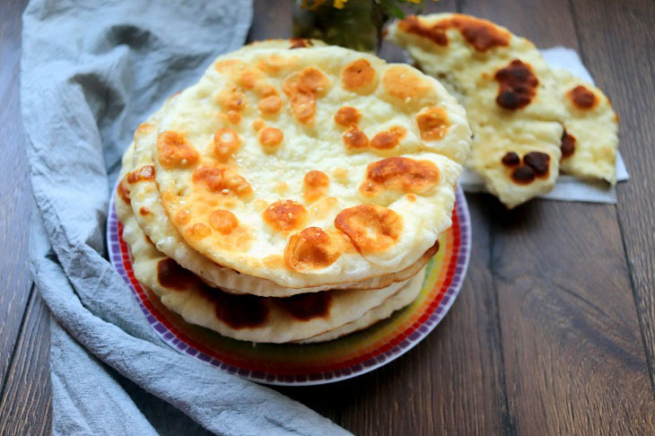 Flatbreads "Bhaturi" - a delicious snack of Indian cuisine