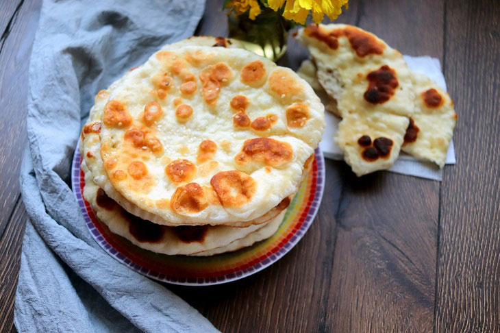 Flatbreads "Bhaturi" - a delicious snack of Indian cuisine