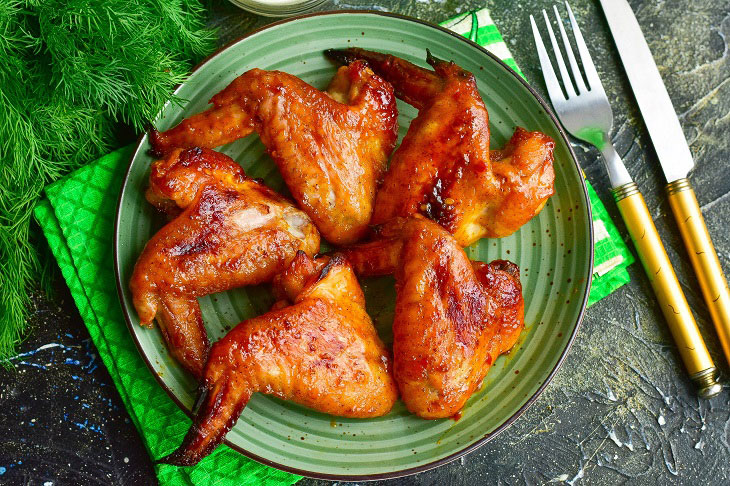 Chicken wings in adjika in the oven - delicious, quick and easy