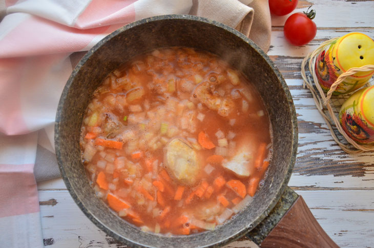 Hake with vegetables in tomato - the fish is very tender and juicy