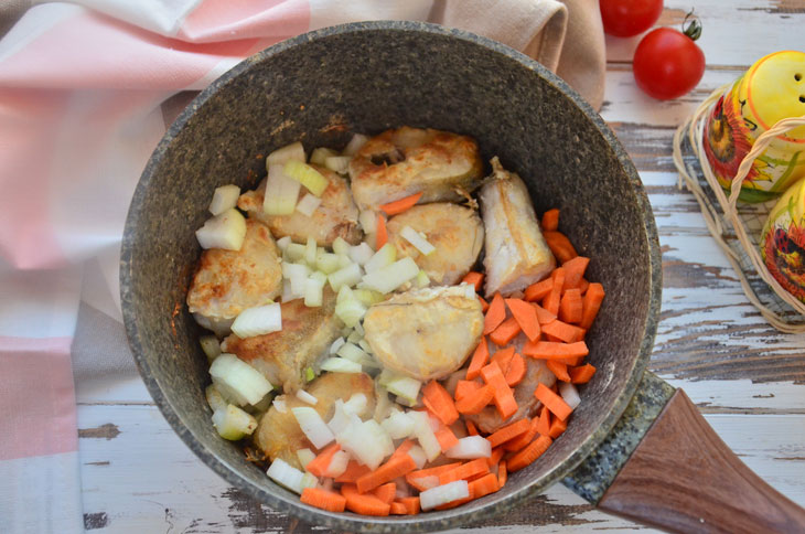 Hake with vegetables in tomato - the fish is very tender and juicy