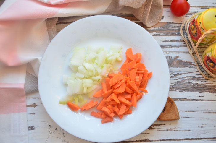 Hake with vegetables in tomato - the fish is very tender and juicy