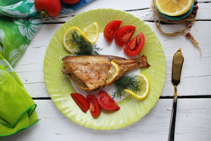 Red perch baked with lemon and rosemary - for lovers of bright flavors