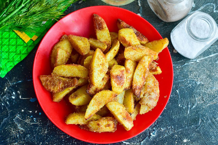 Garlic Potatoes "Eating" in the oven - tasty and appetizing