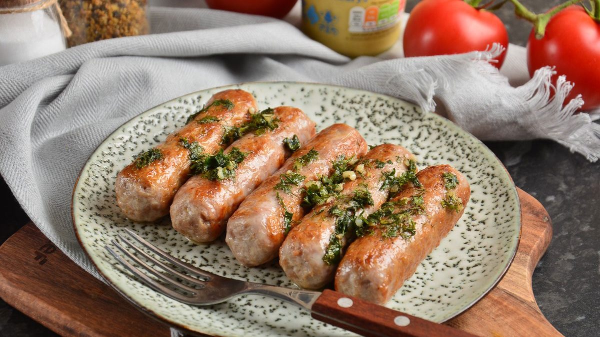 Homemade sausages in a pan – tasty and juicy