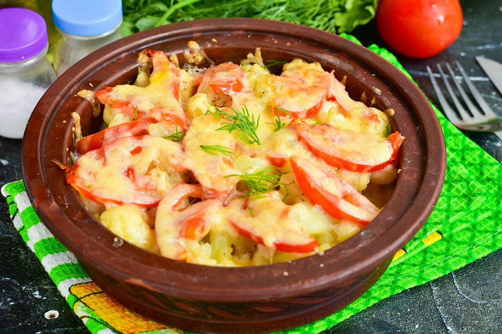 Cauliflower baked with cheese and tomatoes - appetizing and tasty