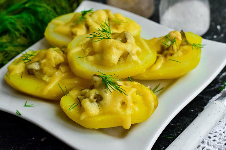 Potatoes in the oven with cucumbers and cheese - easy to prepare, looks beautiful and festive