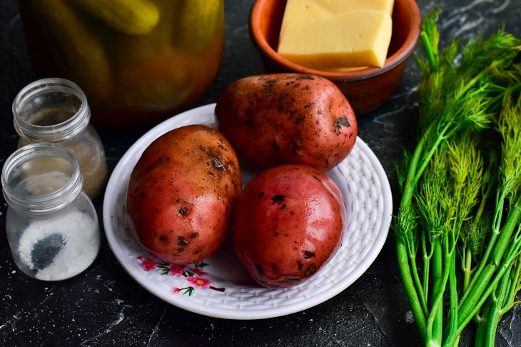 Potatoes in the oven with cucumbers and cheese - easy to prepare, looks beautiful and festive