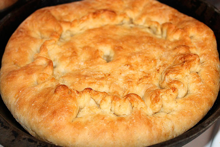 Lean yeast pie with cabbage filling - soft, juicy and delicious