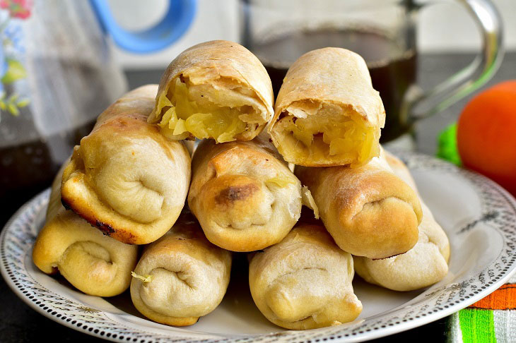 Unusual pies "Cigars" with cabbage - just lick your fingers