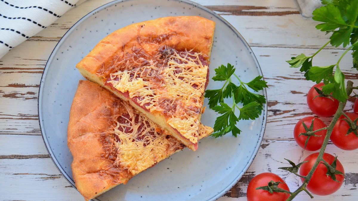 Kefir pizza with sausage in the oven – a delicious express recipe