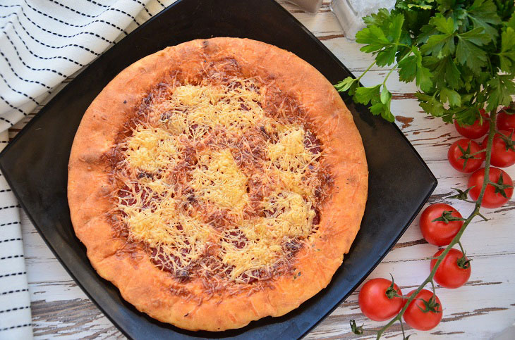 Kefir pizza with sausage in the oven - a delicious express recipe
