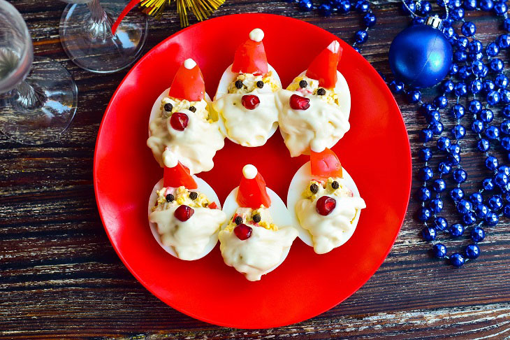 Stuffed eggs "Santa Claus" - an interesting snack on the New Year's table