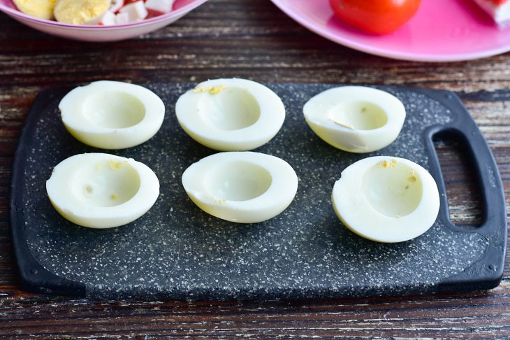 Stuffed eggs "Santa Claus" - an interesting snack on the New Year's table