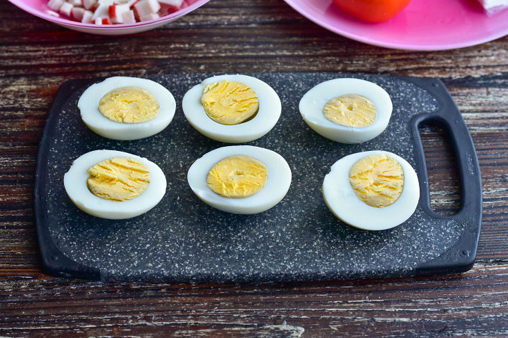 Stuffed eggs "Santa Claus" - an interesting snack on the New Year's table