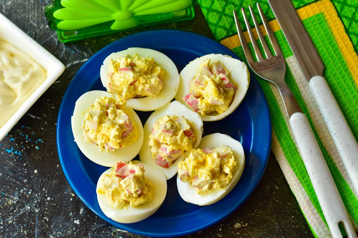 Eggs stuffed with crab sticks - a delicious and elegant appetizer