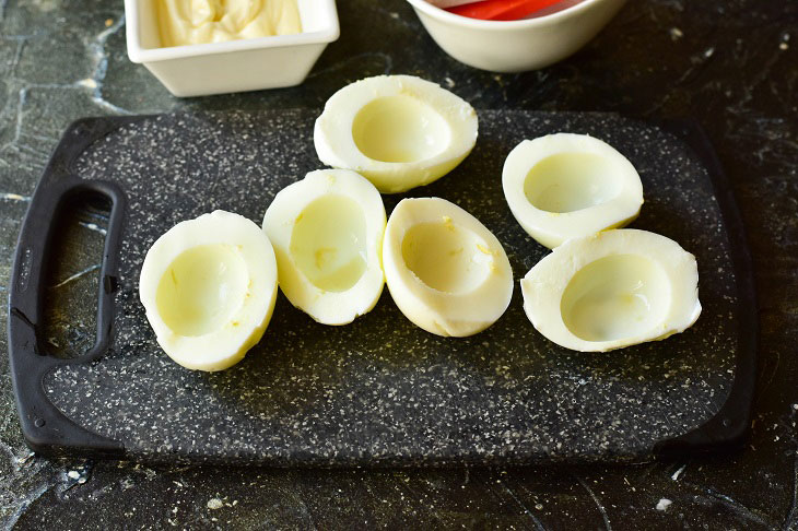 Eggs stuffed with crab sticks - a delicious and elegant appetizer