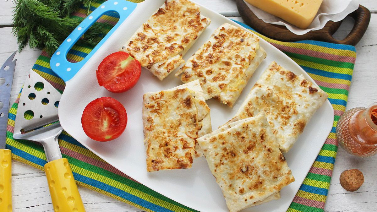 Envelopes from pita bread “Two cheeses” – a delicious snack in a hurry
