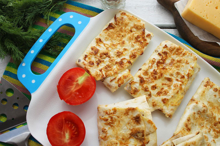 Envelopes from pita bread "Two cheeses" - a delicious snack in a hurry