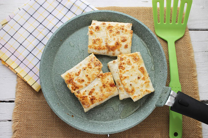 Envelopes from pita bread "Two cheeses" - a delicious snack in a hurry