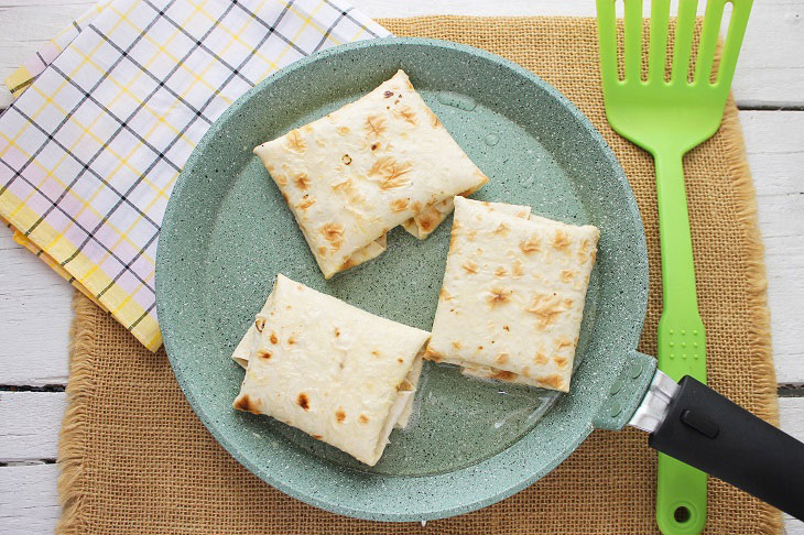 Envelopes from pita bread "Two cheeses" - a delicious snack in a hurry