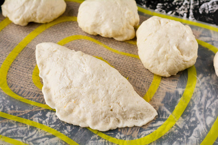 Homemade Gagauz pies with cabbage in a pan - lush and airy