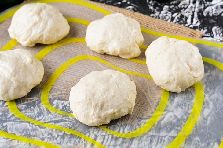 Homemade Gagauz pies with cabbage in a pan - lush and airy