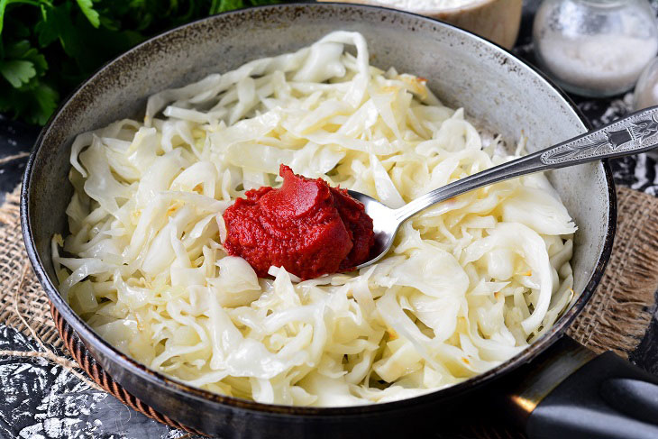 Homemade Gagauz pies with cabbage in a pan - lush and airy