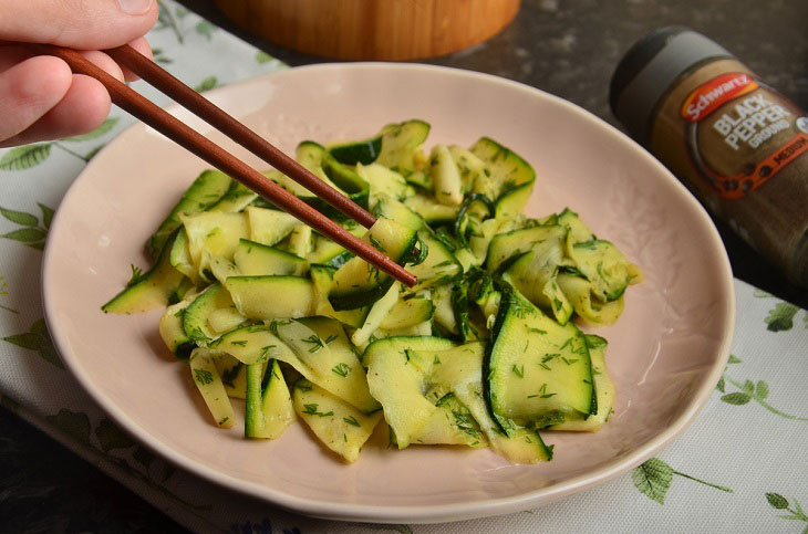 Lightly salted zucchini in a bag with garlic - a quick and easy snack