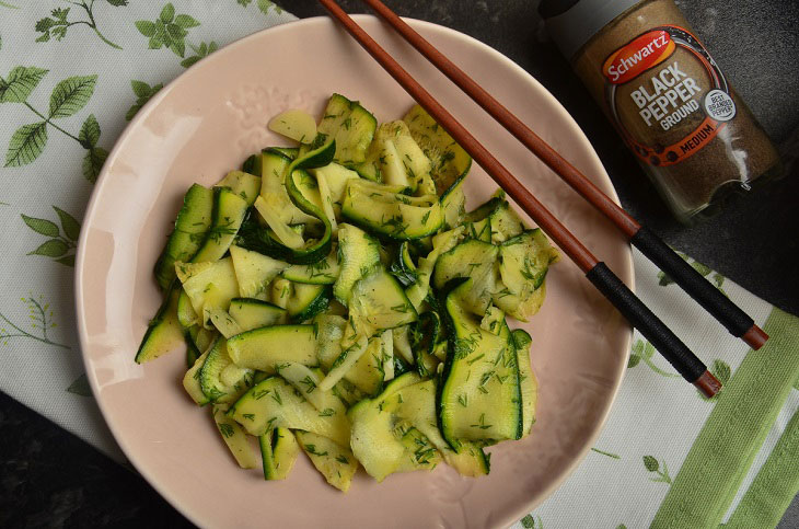 Lightly salted zucchini in a bag with garlic - a quick and easy snack