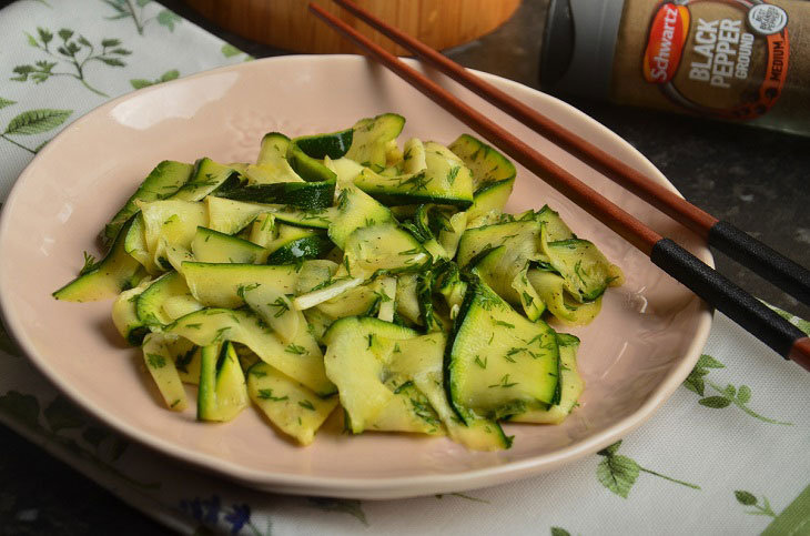 Lightly salted zucchini in a bag with garlic - a quick and easy snack