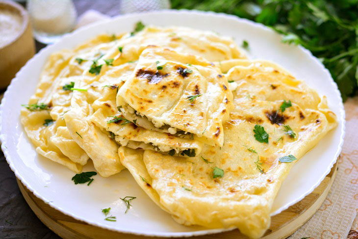 Kutaby with greens and cottage cheese - tender, soft and satisfying