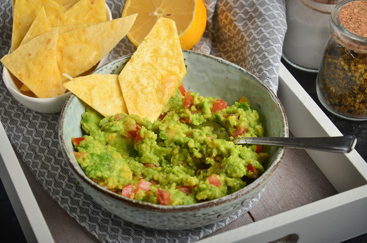 Guacamole with cheese chips - a great snack for a good company