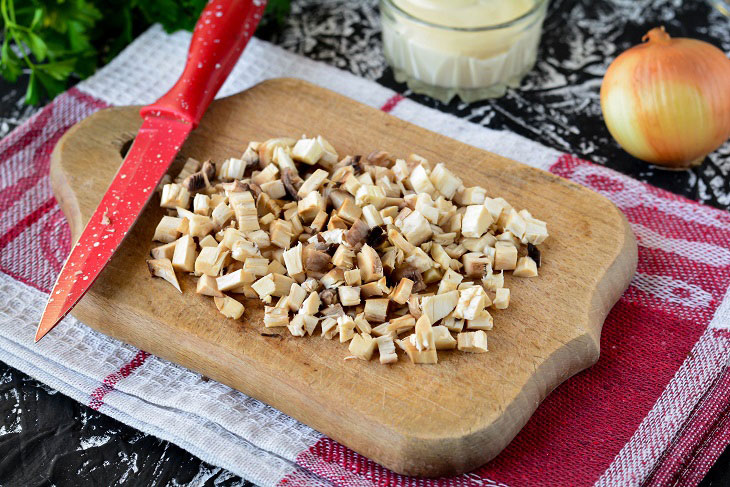 Baked mushrooms with cheese and chicken in the oven - a simple and elegant recipe