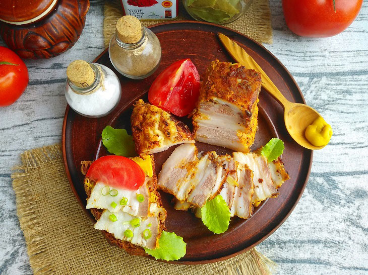 Salo baked in the oven - tender and spicy, with a crispy crust