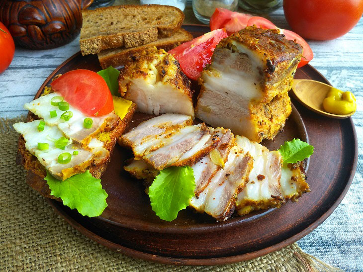 Salo baked in the oven - tender and spicy, with a crispy crust