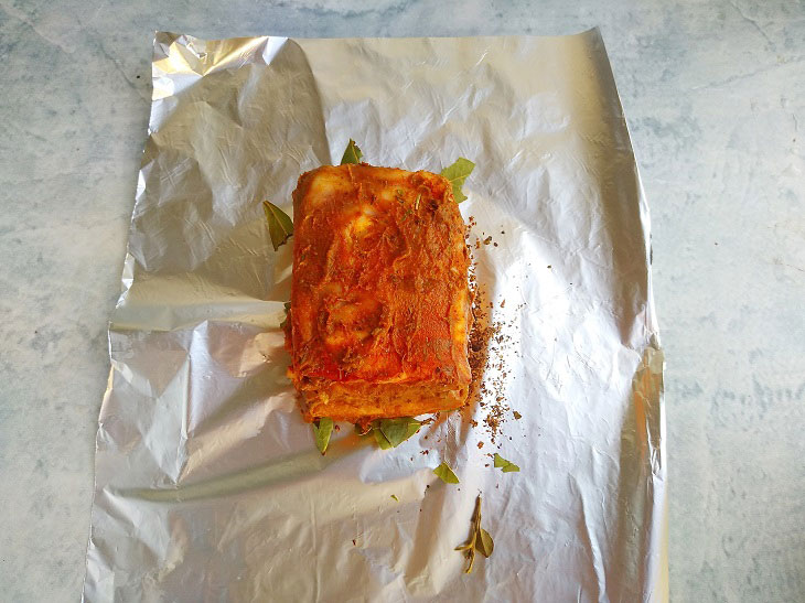 Salo baked in the oven - tender and spicy, with a crispy crust