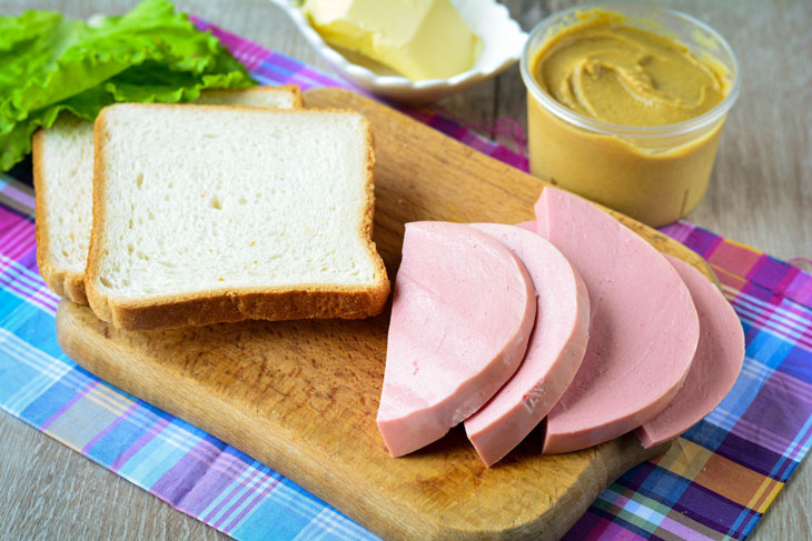 Sandwiches "Nostalgia" with sausage - will always help out the hostess if the guests are on the doorstep