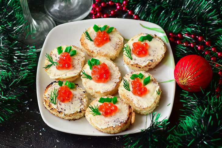 Canape with red caviar - a gourmet appetizer for the New Year