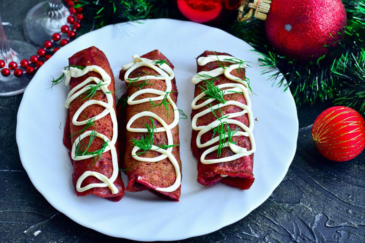 Rolls of beetroot pancakes - a wonderful snack on the festive table
