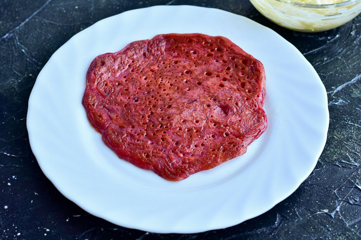 Rolls of beetroot pancakes - a wonderful snack on the festive table